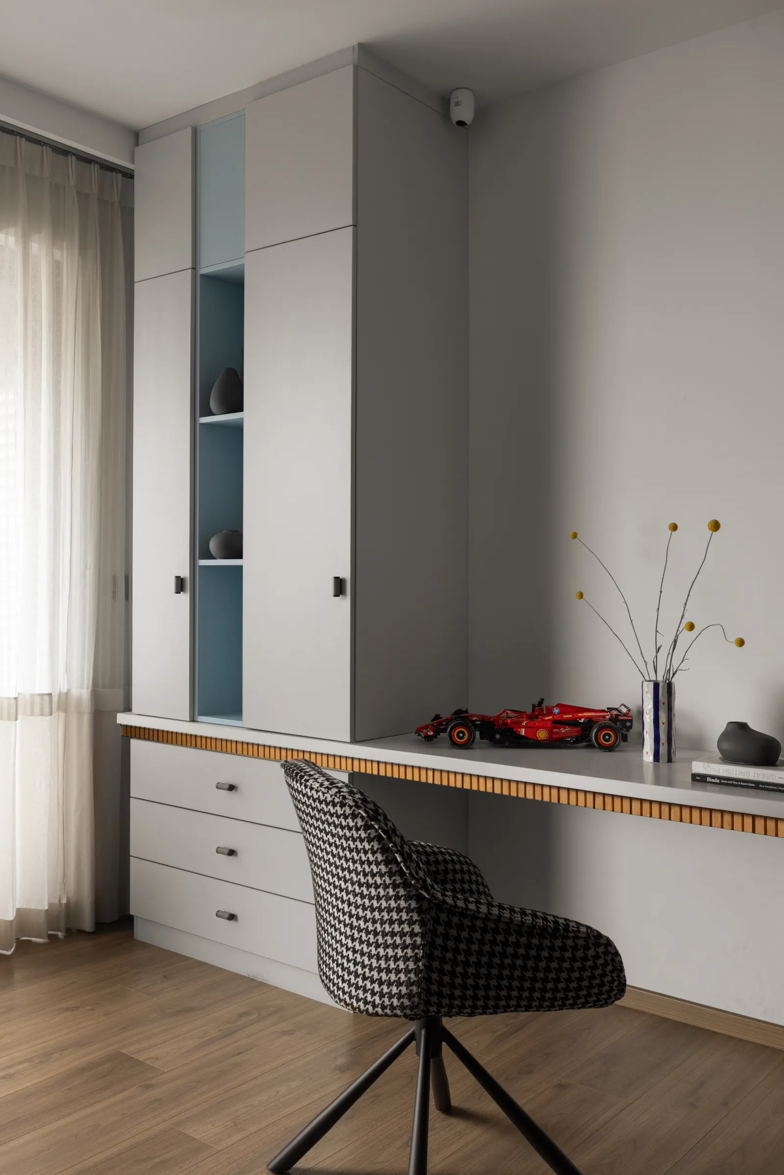 Study nook with wall-mounted desk and storage — Seema Katta Svasa
